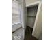 This is a closet with a light and wire shelving for storage at 833 W Franklin St, Shelbyville, IN 46176