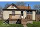 A single-Gathering home with an elevated porch at 833 W Franklin St, Shelbyville, IN 46176