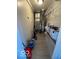 A utility room features a water heater, furnace and shelving at 833 W Franklin St, Shelbyville, IN 46176