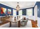 Staged dining room showcasing modern decor and bright natural light at 908 N Bolton Ave, Indianapolis, IN 46219