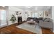 Cozy living room with fireplace, stylish furniture, and ample natural light at 908 N Bolton Ave, Indianapolis, IN 46219