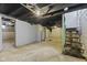 Large basement with concrete floor, painted walls, and exposed ceiling at 914 N Bancroft St, Indianapolis, IN 46201