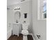 Clean bathroom features a vanity, updated fixtures, and a shower and tub combo at 914 N Bancroft St, Indianapolis, IN 46201