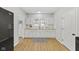 Well-lit kitchen with white cabinets, butcher block countertops, and stainless steel appliances at 914 N Bancroft St, Indianapolis, IN 46201