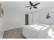 Comfortable main bedroom with wall to wall carpet and neutral decor at 914 N Bancroft St, Indianapolis, IN 46201