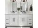 Modern bathroom with double vanity, quartz countertop, and black hardware at 9725 Thorne Cliff Way # 105, Fishers, IN 46037