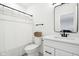 Bright bathroom with white vanity, modern black hardware, and decorative shower curtain at 9725 Thorne Cliff Way # 105, Fishers, IN 46037