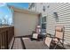 Cozy deck space with seating and a small table, ideal for enjoying the outdoors at 9725 Thorne Cliff Way # 105, Fishers, IN 46037