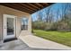 Outdoor patio providing a seamless transition to the grassy lawn, perfect for outdoor enjoyment at 9725 Thorne Cliff Way # 105, Fishers, IN 46037