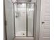 Bathroom featuring glass shower door and brushed nickel hardware at 9800 Ridgecrest Ln, McCordsville, IN 46055
