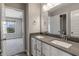Stylish bathroom showcasing a double vanity, providing ample counter space and storage for modern convenience at 9800 Ridgecrest Ln, McCordsville, IN 46055