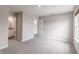 Spacious bedroom with neutral tones, carpet, and natural light from the window at 9800 Ridgecrest Ln, McCordsville, IN 46055