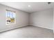 Bedroom featuring natural light from a window, carpet and neutral tones at 9800 Ridgecrest Ln, McCordsville, IN 46055