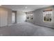 Bonus room offering generous space, natural light, and plush carpeting for comfortable living and versatility at 9800 Ridgecrest Ln, McCordsville, IN 46055