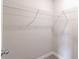 Walk-in closet featuring shelving and neutral wall color at 9800 Ridgecrest Ln, McCordsville, IN 46055