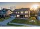 Beautiful two-story home with gray siding, well-manicured lawn, and an attached two-car garage at 9800 Ridgecrest Ln, McCordsville, IN 46055