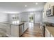 Modern kitchen with stainless steel appliances and an island, perfect for entertaining at 9800 Ridgecrest Ln, McCordsville, IN 46055
