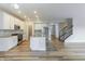 Bright kitchen boasts stainless steel appliances, a spacious island, and an open layout at 9800 Ridgecrest Ln, McCordsville, IN 46055