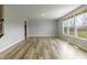 Bright living room featuring multiple windows offering great outdoor views at 9800 Ridgecrest Ln, McCordsville, IN 46055