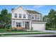 Charming two-story home with gray siding, white trim, and a well-manicured lawn at 995 Penrose Pl, Danville, IN 46122