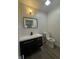 Modern bathroom with a sleek vanity, black hardware, and a clean design at 1001 N 14Th St, Elwood, IN 46036
