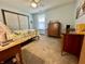Relaxing bedroom with neutral walls, a queen bed, and classic wood furniture at 1008 E Apple Lake Dr, Greenfield, IN 46140