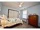 Comfortable bedroom offers bright walls, carpeting, and a large closet at 1008 E Apple Lake Dr, Greenfield, IN 46140