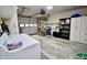 Clean and spacious garage featuring a washing machine and dryer at 1008 E Apple Lake Dr, Greenfield, IN 46140