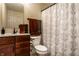 Bright bathroom featuring modern fixtures, new vanity, and shower with decorative curtain at 1057 3Rd Nw Ave, Carmel, IN 46032