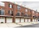 Charming brick townhomes offer private garages, balcony access, and well-maintained grounds at 1057 3Rd Nw Ave, Carmel, IN 46032