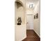 Inviting hallway with dark hardwood floors, recessed lighting, and stylish decorative accents at 1057 3Rd Nw Ave, Carmel, IN 46032