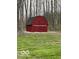 View of the storage barn with crossed doors for a farmhouse look at 1066 N Dogwood Way, Greenfield, IN 46140