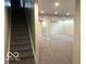 Bright basement with stairs to upper level at 1066 N Dogwood Way, Greenfield, IN 46140