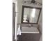 Bathroom with a modern vanity, sink, and a large mirror reflecting the toilet at 1066 N Dogwood Way, Greenfield, IN 46140