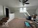 Bright bonus room with stairs and sky lights at 1066 N Dogwood Way, Greenfield, IN 46140