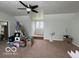 Bright bonus room with a ceiling fan and lots of space at 1066 N Dogwood Way, Greenfield, IN 46140