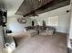 Stylish living room with a beamed ceiling, a brick fireplace, built-in shelves, and a comfortable sectional sofa at 1066 N Dogwood Way, Greenfield, IN 46140