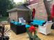Expansive wooden deck with stylish outdoor furniture perfect for entertaining and relaxing in the backyard at 1066 N Dogwood Way, Greenfield, IN 46140