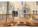 Well-maintained deck with decorative railings and steps, ideal for relaxing and backyard access at 10775 Northhampton Dr, Fishers, IN 46038