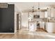 Eat-in kitchen with a center island, stainless appliances, and modern lighting at 10775 Northhampton Dr, Fishers, IN 46038