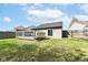 Backyard with deck and sliding glass doors at 10839 Cedar Pine Dr, Indianapolis, IN 46235