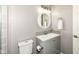 Modern bathroom featuring a sleek vanity, round lighted mirror, and neutral paint at 10839 Cedar Pine Dr, Indianapolis, IN 46235