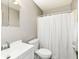 Standard bathroom with white vanity and shower featuring a white shower curtain at 10839 Cedar Pine Dr, Indianapolis, IN 46235