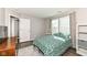 Comfortable bedroom with ample natural light, ensuite bathroom, and modern finishes at 10839 Cedar Pine Dr, Indianapolis, IN 46235