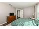 Comfortable bedroom with ample natural light, ensuite bathroom, and modern finishes at 10839 Cedar Pine Dr, Indianapolis, IN 46235