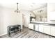 A spacious kitchen featuring modern appliances, light countertops, and wood flooring at 10839 Cedar Pine Dr, Indianapolis, IN 46235