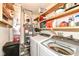 Laundry room with washer, dryer, shelving and mechanics at 10839 Cedar Pine Dr, Indianapolis, IN 46235