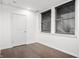 Bright bedroom with a double window, offering a serene space for rest and relaxation at 110 Washington St # 301, Indianapolis, IN 46204