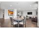 Spacious dining area with a round table and seating for four, perfect for Gathering meals and entertaining at 110 Washington St # 301, Indianapolis, IN 46204