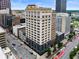 Aerial view of a brick commercial building in the city at 110 Washington St # 301, Indianapolis, IN 46204